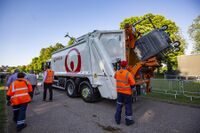 RCV Commercial Collection emptying 1100 litre Wheelie Bin, all rights reserved Veolia