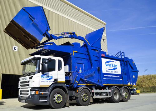 Scania FEL Lorry with FEL Skip in process of being lifted, all right reserved Bakers Waste